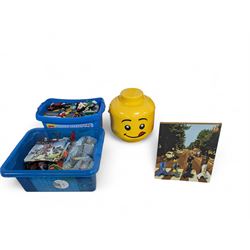Collection of Lego, including built Bionicles Mistika models with instructions, loose Lego pieces, Lego Beatles Abbey Road canvas print and a Lego head storage box
