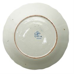 Set of four French Nevers style revolutionary faience plates, the first painted with a portrait of 'Evêque de Meaux' or the Bishop of Meaux,  another decorated with a putto holding a flaming torch and a flag inscribed 'W Lamour' beneath a slogan 'Cest le moment de faire un petit enfant' or 'Now is the time to make a child', another decorated with 'Vive les bons citoyens' or 'Long live the good citizens' within foliage, and another with a portrait of an officer, probably Napoleon, with the phrase 'Vive la Nation' or 'Long live the Nation', each bearing dates, with indistinct blue monogram to bases, D24cm (4)