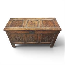18th century style oak coffer, panelled rectangular top hinged to reveal storage with candle box, carved frieze and front panels, raised on stile feet