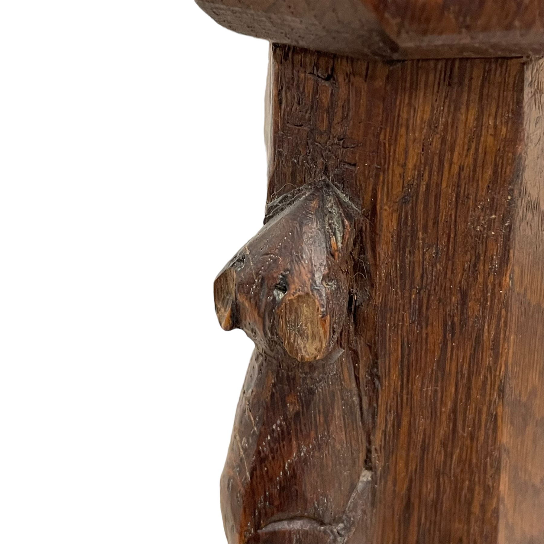 Mouseman - circa. 1930s set of six (4+2) oak dining chairs, panelled back carved with the Bagshawe family crest, the moto 'Forma Flos Fama Flatus' over an arm grasping a bugle-horn with ribbon tie and Yorkshire rose motif, adzed frame, leather lattice strap seat, on octagonal supports united by stretchers, two carvers and four side chairs, each carved with mouse signature, by Robert Thompson of Kilburn 

Provenance: Owned since manufacture by the Bagshawe family, descendants of the Staithes Group Artist Joseph Richard Bagshawe RBA (1870-1909).