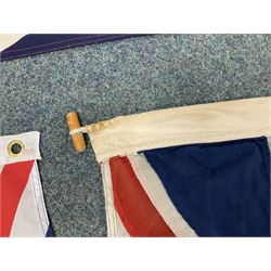 Six flags - White Ensign 180 x 86cm; two Union flags 180 x 86cm and 132 x 62cm; Falklands Islands 153 x 89cm; Yorkshire Rose 153 x 89cm; and QEII 1953 Coronation 84 x 57cm (6)