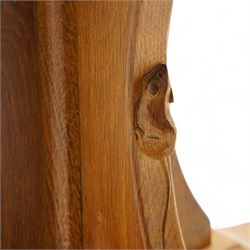 Mouseman - oak coffee table, octagonal adzed top on cruciform base and sledge feet, carved with mouse signature, by the workshop of Robert Thompson, Kilburn