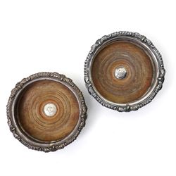Pair of Victorian silver plated bottle coasters with turned boxwood bases D16cm, 19th century plated tea caddy engraved 'Kabul 1879' and a plated tea caddy with lion mask ring handles W16cm 