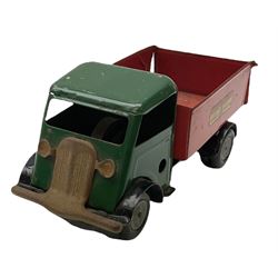 Eight Tri-ang Minic tin-plate/plastic clockwork vehicles comprising Tipper Lorry, Post Office Telephones Van, Caterpillar Tractor, Evening News Van, two Royal Mail Vans, American jeep and saloon car; all unboxed (8)