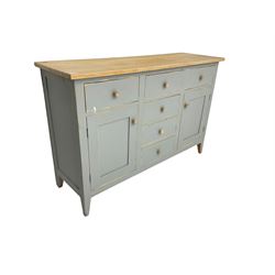 Painted pine sideboard, fitted with six drawers and two cupboards, on square tapering supports 