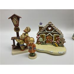 Eight Christmas Hummel figures by Goebel, to include Wintertime Chapel candle holder, Winter Fun, Christmas Morning, Christmas Time and Gingerbread Lane, tallest H21cm