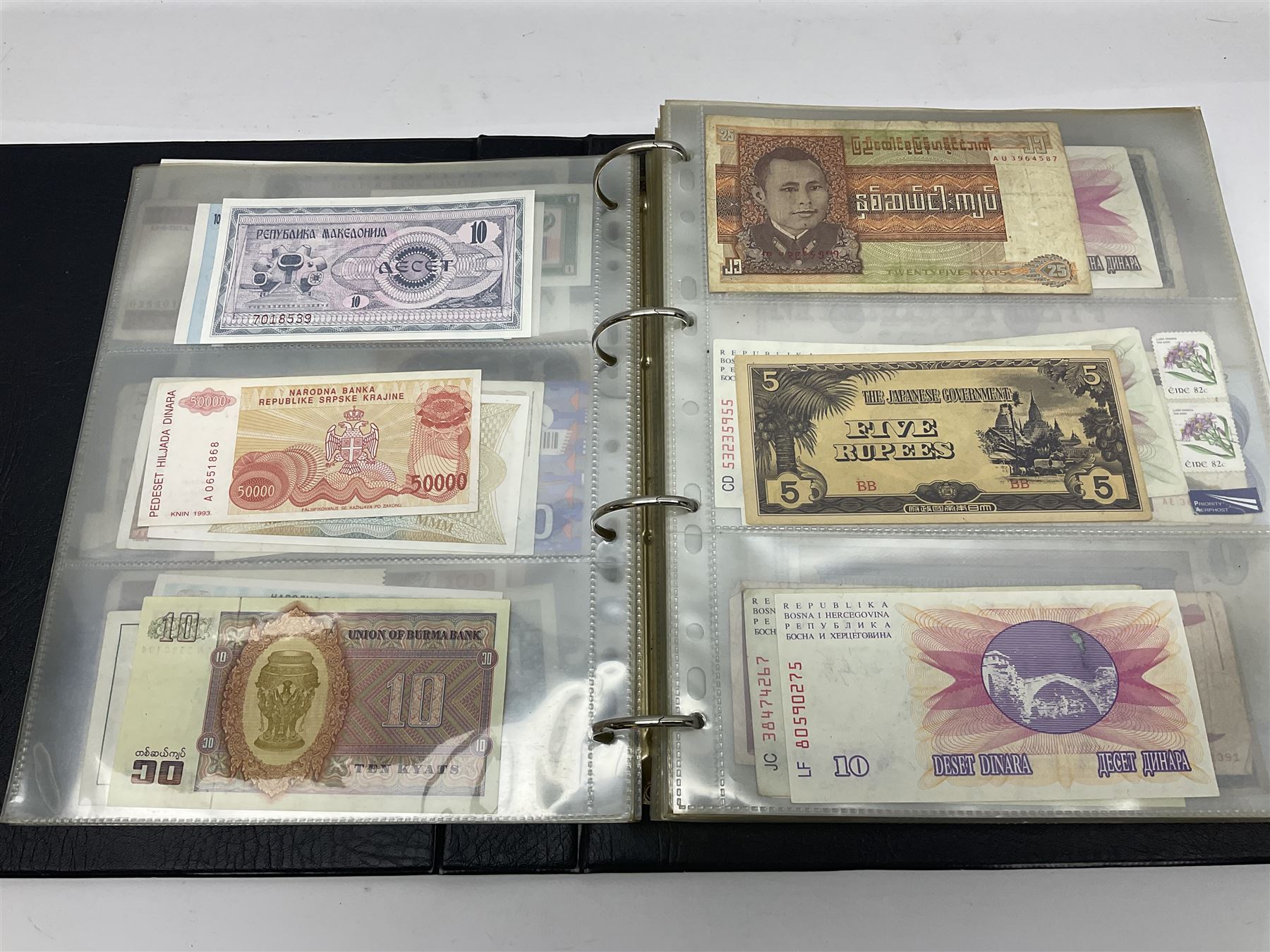 World and Great British banknotes to include Brazil, Canada, France, Germany, Ghana, Indonesia, Iraq, Hong Kong, Hungary, Japan, Vietnam, Zimbabwe, a collection of Chinese ‘Hell Money’, and quantity of ‘De La Rue Systems’ test notes, housed in ring binder and loose