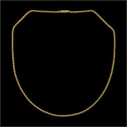 Early 20th century gold rope twist chain necklace, the barrel clasp with engraved decorati...
