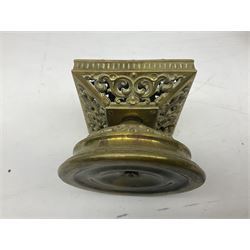 Collection of victorian and later brass desk accessories, to include a letter holder with cherub design, ink well of square form with hinged lid, brass table bell, brass casket with relief decoration, etc  
