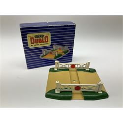 Hornby Dublo - six D1 accessories comprising Turntable; Through Station with separately boxed Platform Extension with Wall; Signal Cabin with orange roof and two packs of station names; Level Crossing; and Island Platform; all boxed (6)