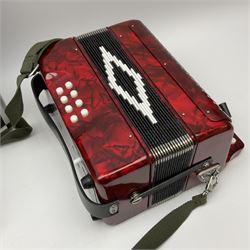 Modern small twenty-nine button accordion with red pearline finish W29cm in aluminium flight case with instructional DVD