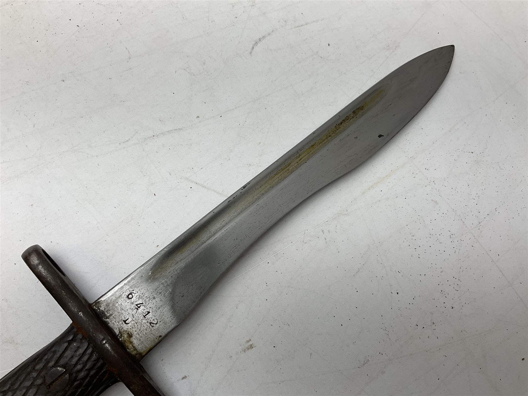 Austrian Model 1895 carbine NCO's knife bayonet with 25cm fullered steel blade; in steel scabbard with webbing frog L39cm overall; and Spanish Model 1941 Bolo bayonet with 25cm fullered steel blade No.6412D; in steel scabbard (2)