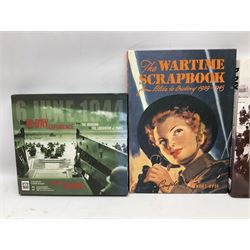 Thirty modern books of military interest including The Wartime Scrapbook 1939-1945; D-Day by Stephen Badsey; The D-Day Experience by Richard Holmes; Desert Rats by John Parker; A Most Secret Squadron by Des Curtis; Flying Colours - The Epic Story of Douglas Bader by Laddie Lucas etc; and quantity of DVDs of war and military interest