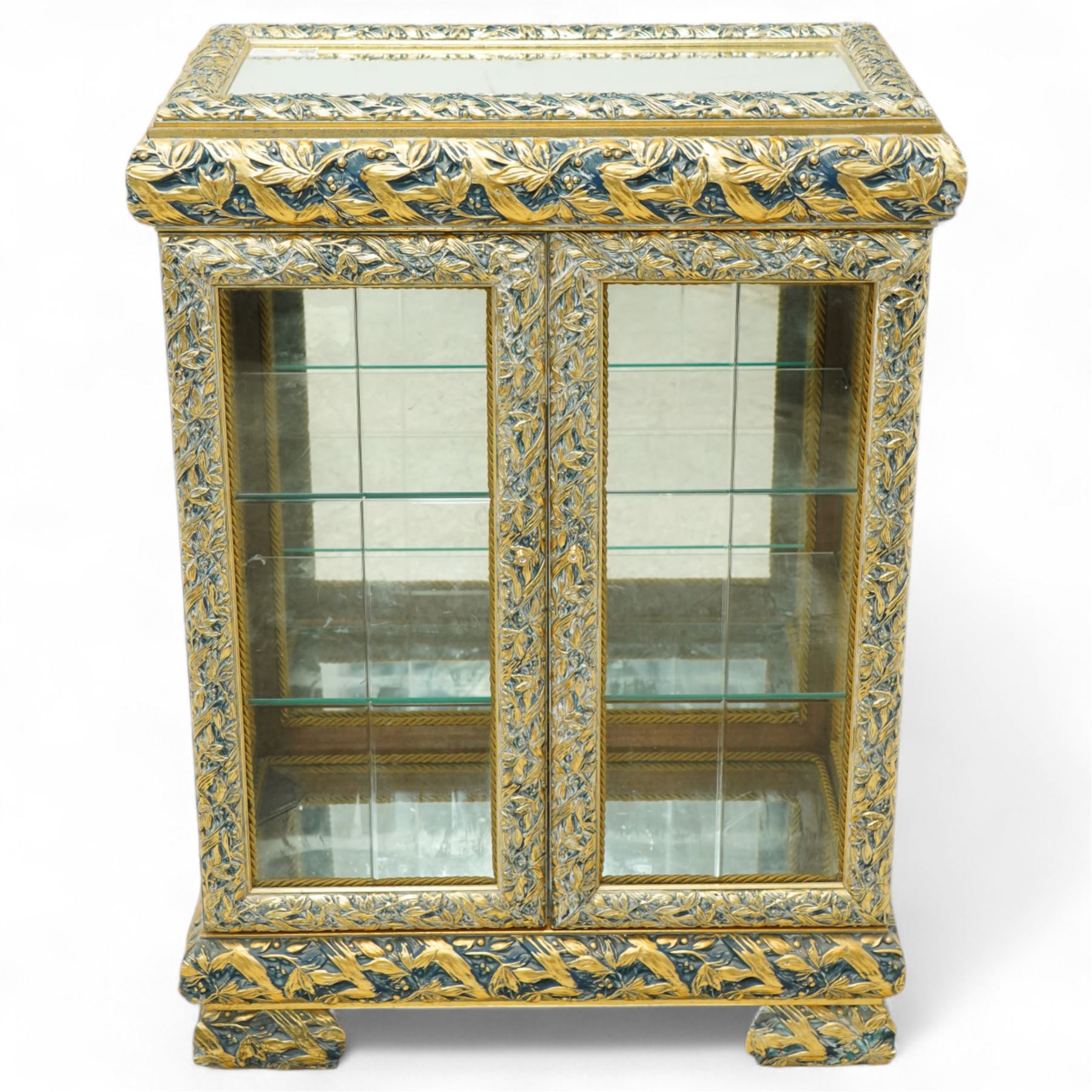 Astoria Grand, Constance dining cabinet, mirrored top, carved wood and gold painted, two glass panelled doors with glass shelves on bracket-type feet