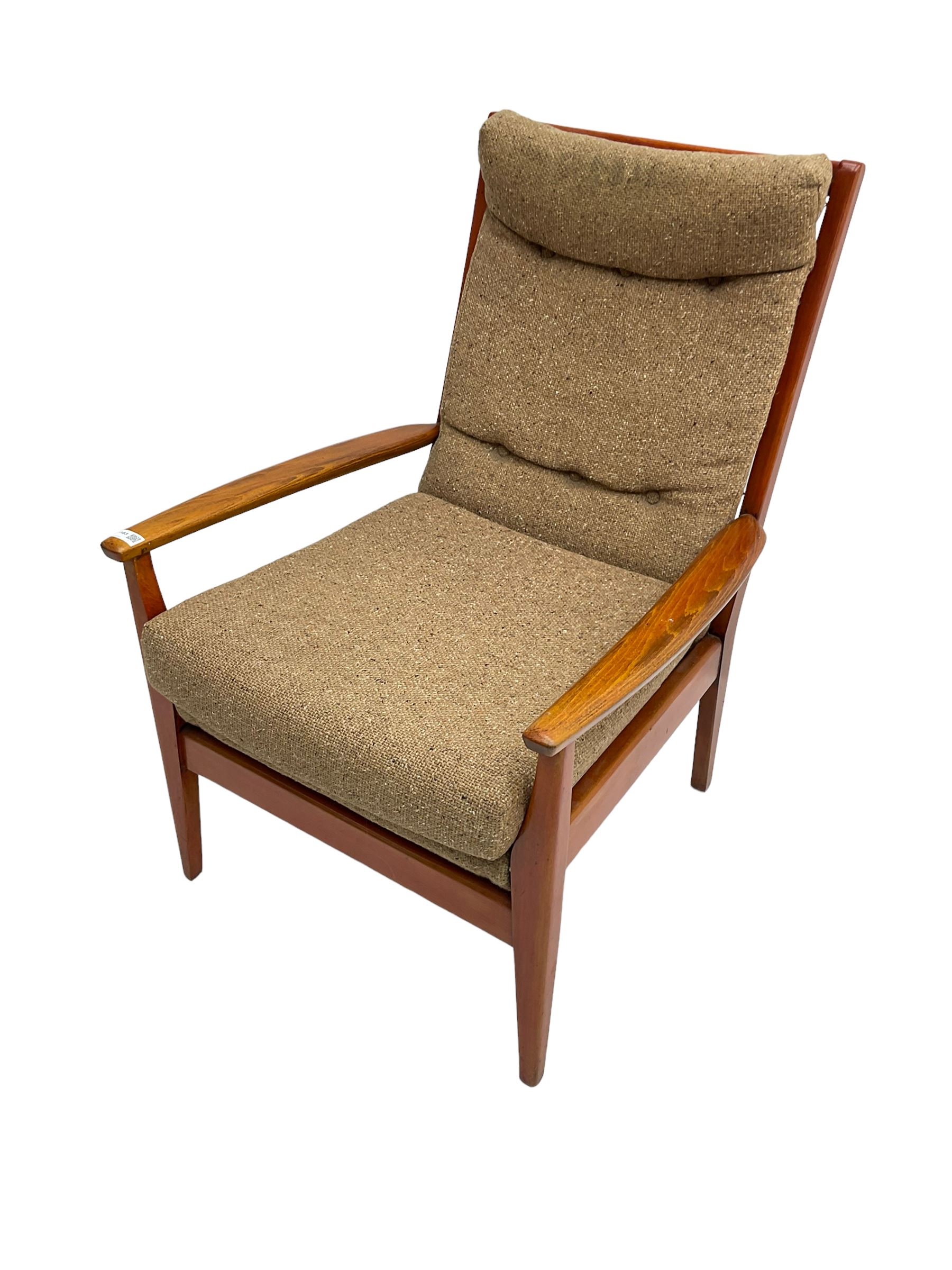 Cintique - mid 20th century teak framed easy chair with upholstered button back seat and back rest, on tapering supports