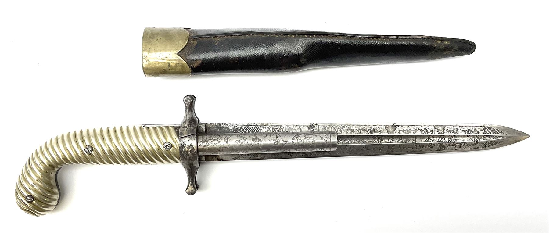 Rare double barrel percussion knife pistol by Dumonthier & Sons (NVN), approx. .38 calibre, with 8.5cm barrels and central 21.5cm spear pointed blade, all with etched damascening, upper quillons serve as hammers for the percussion ignition with single drop down trigger and fluted nickel grips, in nickel mounted leather covered tin scabbard L33.5cm overall