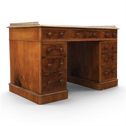 Victorian figured walnut twin pedestal desk, brass galleried top with inset tooled green l...