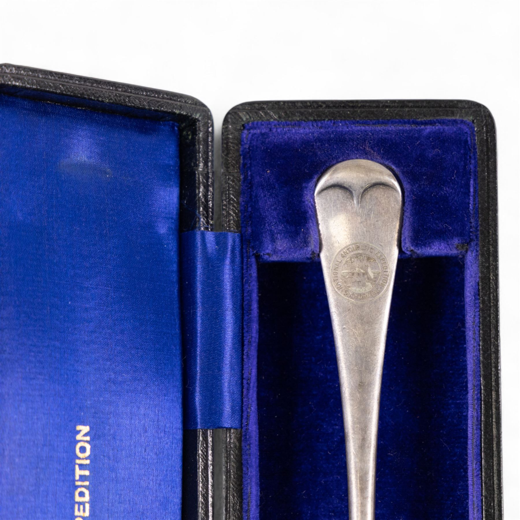 Capt Scotts' British National Antarctic Expedition 1901-1904: table fork from relief ship SY Morning, an electroplated nickel silver table fork, engraved with circular crest reading 'National Antarctic Expedition SY Morning', the fork with maker's mark for Daniel and Arter Ltd, Birmingham, stamped with trade name 'Nevada Silver', in tooled leather case impressed with gilt initials 'AMHC', with blue silk and velvet interior, the gilt lettering to interior reading 'Capt Scotts' British Antarctic Expedition'

Notes: The SY Morning was a steam yacht that served as a relief and resupply vessel for Captain Scott's Discovery during the British National Antarctic Expedition 1901-1904