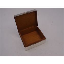 1930s silver mounted cigarette box, of square form, with engine turned decoration and blank rectangular panel to hinged cover, opening to reveal softwood lined interior, hallmarked William Neale & Son Ltd, Birmingham 1934, H3.8cm