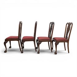 Chippendale design set of ten (8+2) mahogany dining chairs, serpentine cresting rails with carved detail over pierced ribbon-tied splats, red damask upholstered drop-in seats, on cabriole supports with acanthus carved knees and claw and ball feet