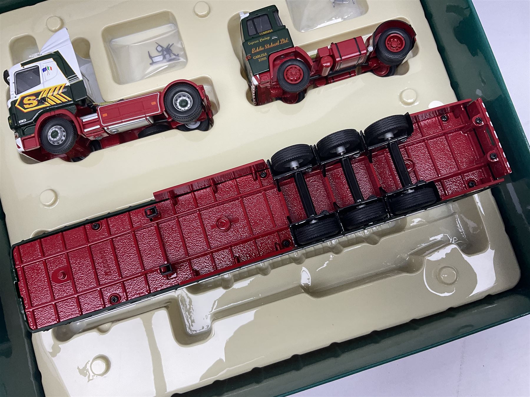 Corgi Eddie Stobart - two limited edition Hauliers of Renown sets; CC99203 Edward Stobart 1954-2011 Commemorative Set; and CC99202 1970-2010 40th Anniversary Set; both boxed (2)