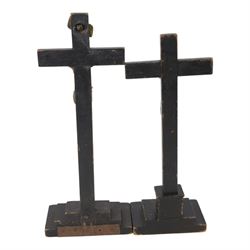 Collection of crucifixes, including wooden and meal examples, largest H63cm