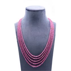 18ct gold pink sapphire necklace, five graduating stands of faceted pink sapphires, with an 18ct gold clasp, London 2004