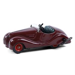 Schuco Akustico 2002 tinplate clockwork car, in burgundy with green metallic interior, with key