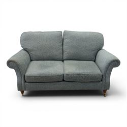 Marks & Spencer - 'Salisbury' two seater sofa, upholstered in blue fabric, scrolled arms and loose cushions