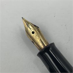 Pelikan Souveran 140 fountain pen, the green and black striped barrel with gold plated beak shaped clip and bands, with gold nib stamped 14C-585, together with matching twist ballpoint pen, push ballpoint pen and propelling pencil, largest approx L13.5cm (4)