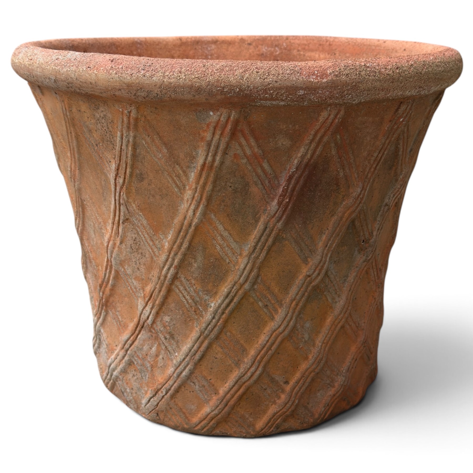 Terracotta pot of generous proportions with rolled rim and lattice design in relief