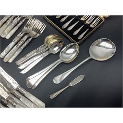 Mother of Pearl handled cutlery, with silver ferrules, comprising six fish knives and forks and six fruit knives and forks, the ferrules hallmarked Yates Brothers, Sheffield 1905, together with silver plated Edwardian three piece tea service and other flatware 