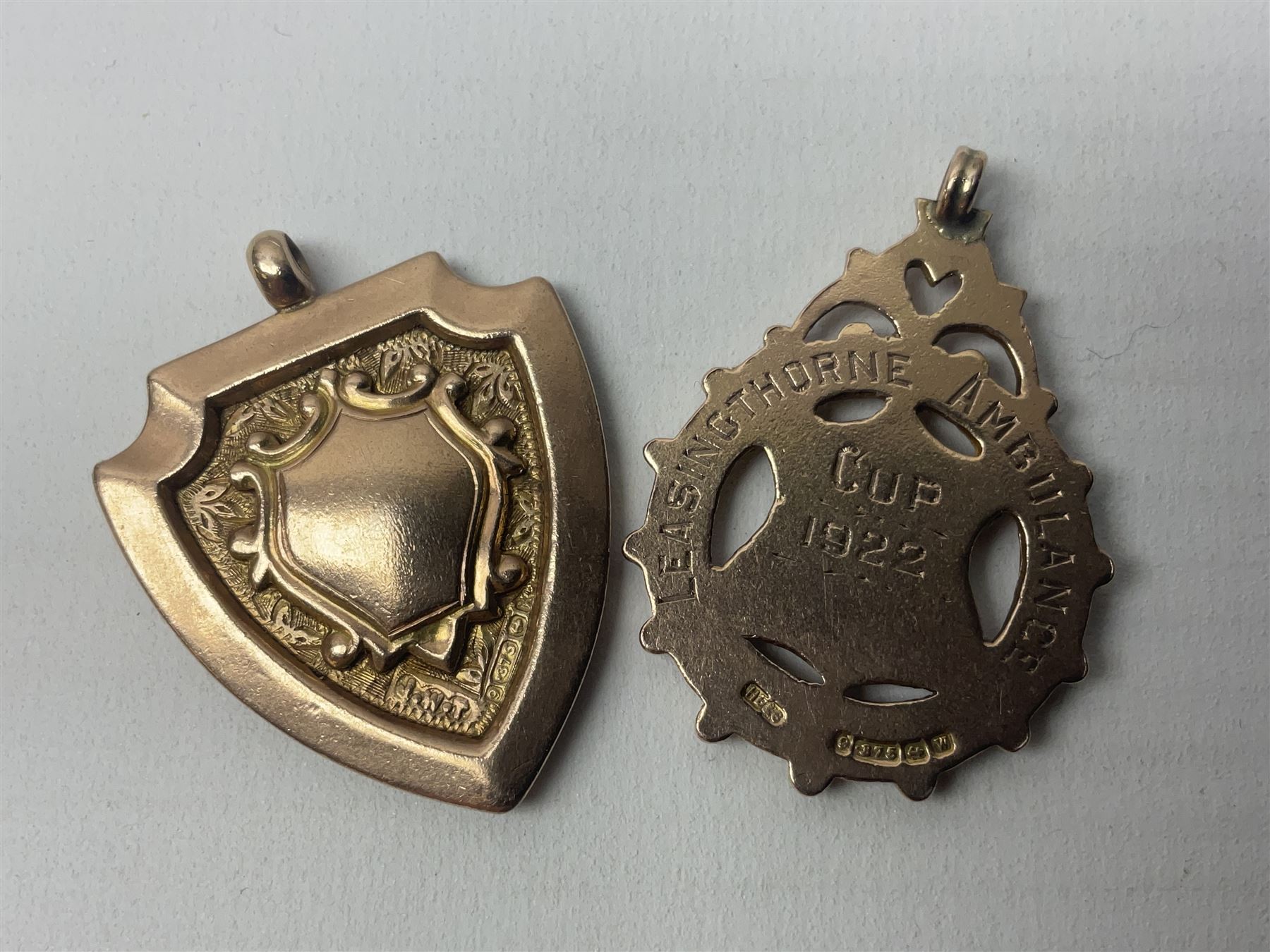 Two early 20th century 9ct rose gold fobs, both hallmarked 