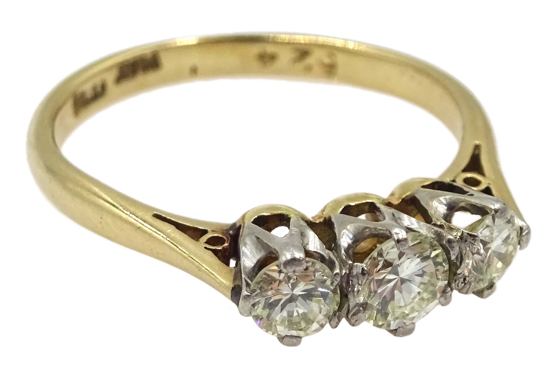 Three stone round brilliant cut diamond ring, stamped 18ct Plat, total