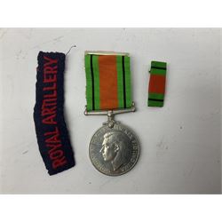 Royal Artillery 9ct gold and enamel sweetheart brooch in original box; together with Royal Artillery shoulder title, brass badges and buttons; and WW2 Defence Medal in issue box to 232775 addressed to Mrs. J.M. Morgan