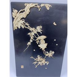 An early 20th century Japanese Shibayama panel, depicting three birds seated upon a blossoming branch in ivory and mother of pearl, with applied ivory character mark panel lower left, H45.5cm L30cm. 