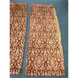 Pair of Victorian flocked fabric curtains decorated with birds and stylised floral motifs in sienna against a gold ground, L216cm 