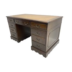 Early 20th century mahogany twin pedestal desk, fitted with nine drawers, with inset leather top