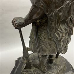 Pair of bronzed figure modelled as a hunter in traditional dress, each holding a pike, H48cm