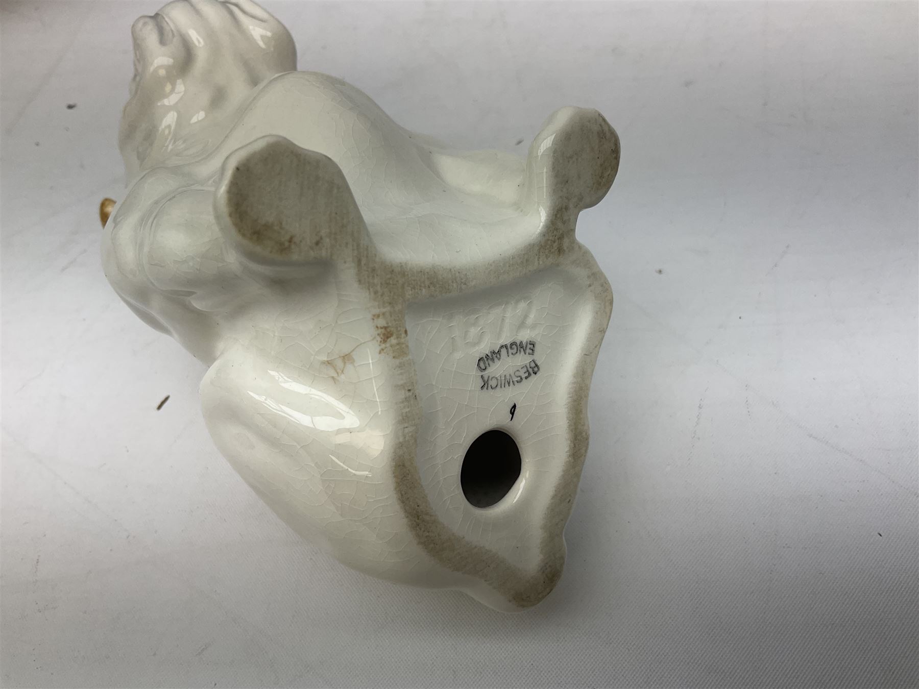 Beswick model of a seated bulldog, model no. 1872, Beswick Laurel & Hardy cruet set on stand, no. 575, Melba Ware animal figures to include large horse, hippo, rhino, USSR tiger cub figure, other ceramics to include Mason's lidded jar etc