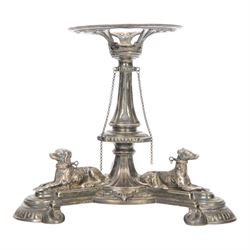 Edwardian silver plated centrepiece stand, the tripart base with applied recumbent hunting...