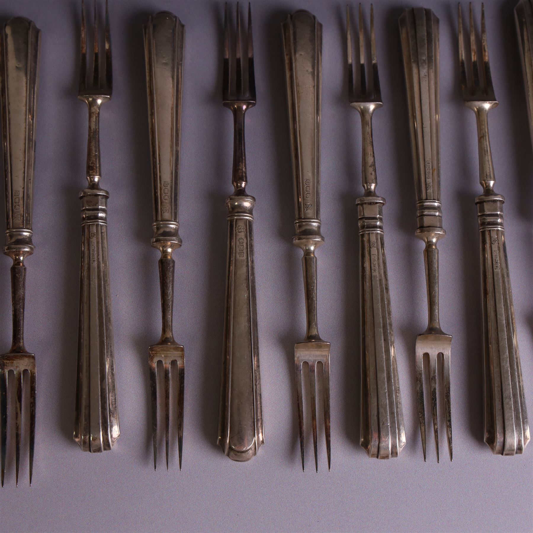 Set of twelve 1920s silver handled dessert knives and forks, hallmarked Thomas Bradbury & Sons Ltd, Sheffield 1921