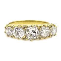  18ct gold (tested) five stone diamond ring, central diamond approx 0.9 carat  