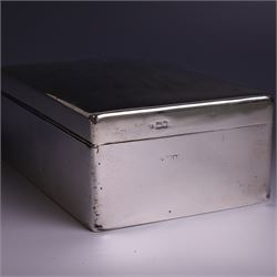 WWII silver mounted cigarette box, of rectangular form, the hinged cover inscribed 'presented to Major & Mrs James Bennett on the occasion of their marriage by the officers of the Liverpool Wardens Service October 1944' and engraved with twenty-four signatures of the officers, with softwood interior, hallmarks worn and indistinct, H7.5cm, W19cm