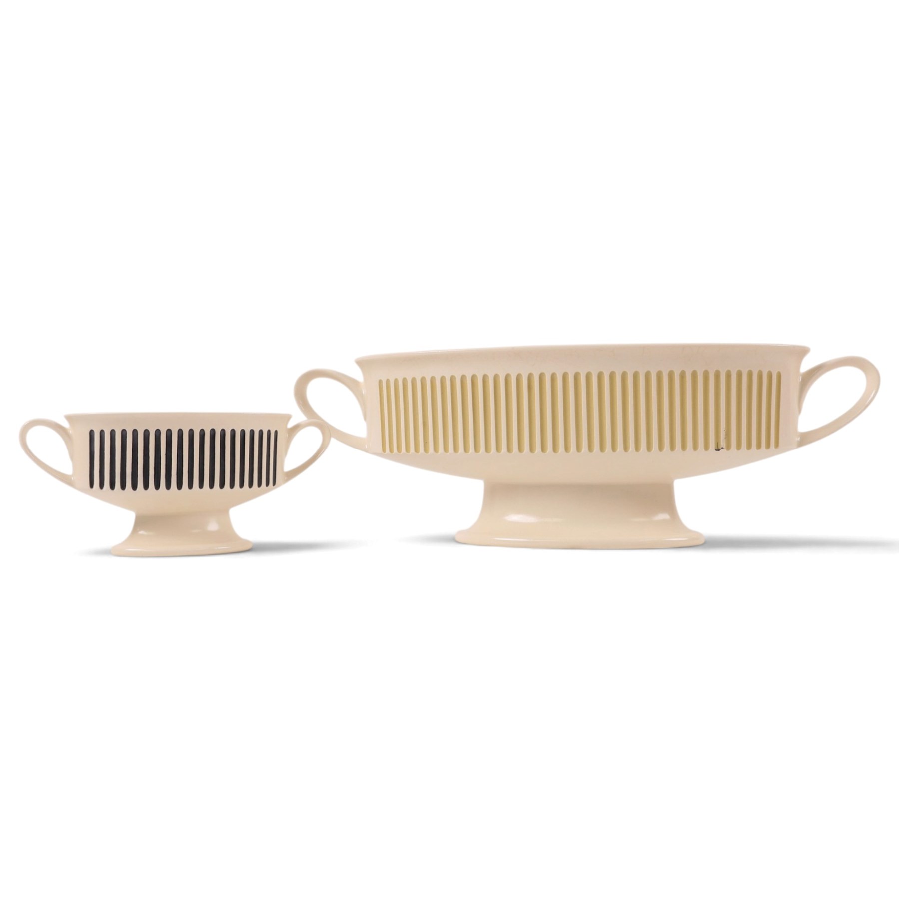 John Clappison for Hornsea pottery, four ashtrays and two twin handled vases, each with brightly coloured stripes on a white ground, largest vase H12cm