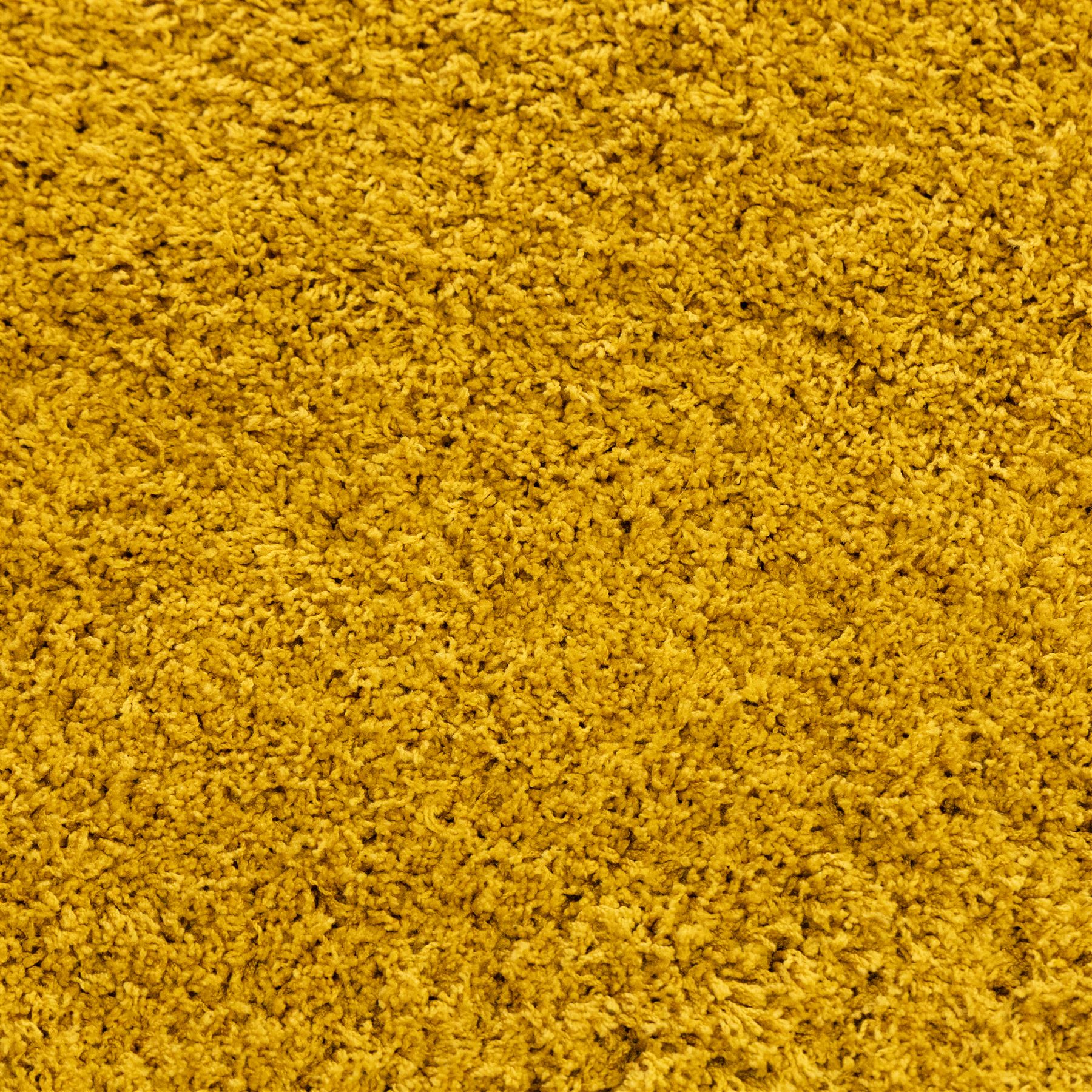 Next Home - large gold coloured cosy twist rug, polyester main with a cotton backing