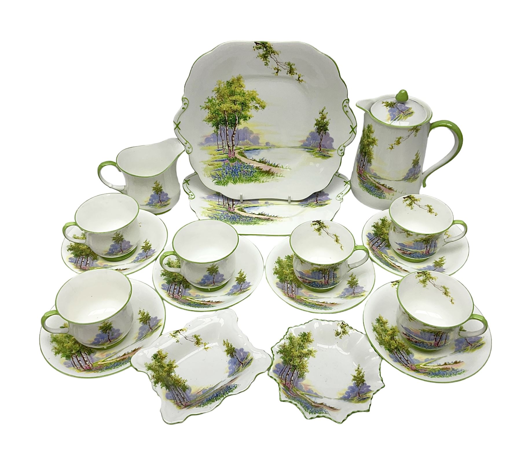 Aynsley Bluebell Time 'As Supplied to the Queen' tea service, comprising hot water jug, six teacups and saucers, milk jug, two cake plates and tow trinket dishes  