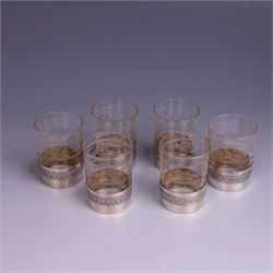 French silver mounted glass decanter and shot glass set, the decanter with silver covered stopper, removable silver collar, and etched decoration to glass body, the six silver mounted glasses each with etched decoration, silver stamped with Minerva's head, decanter H 21cm