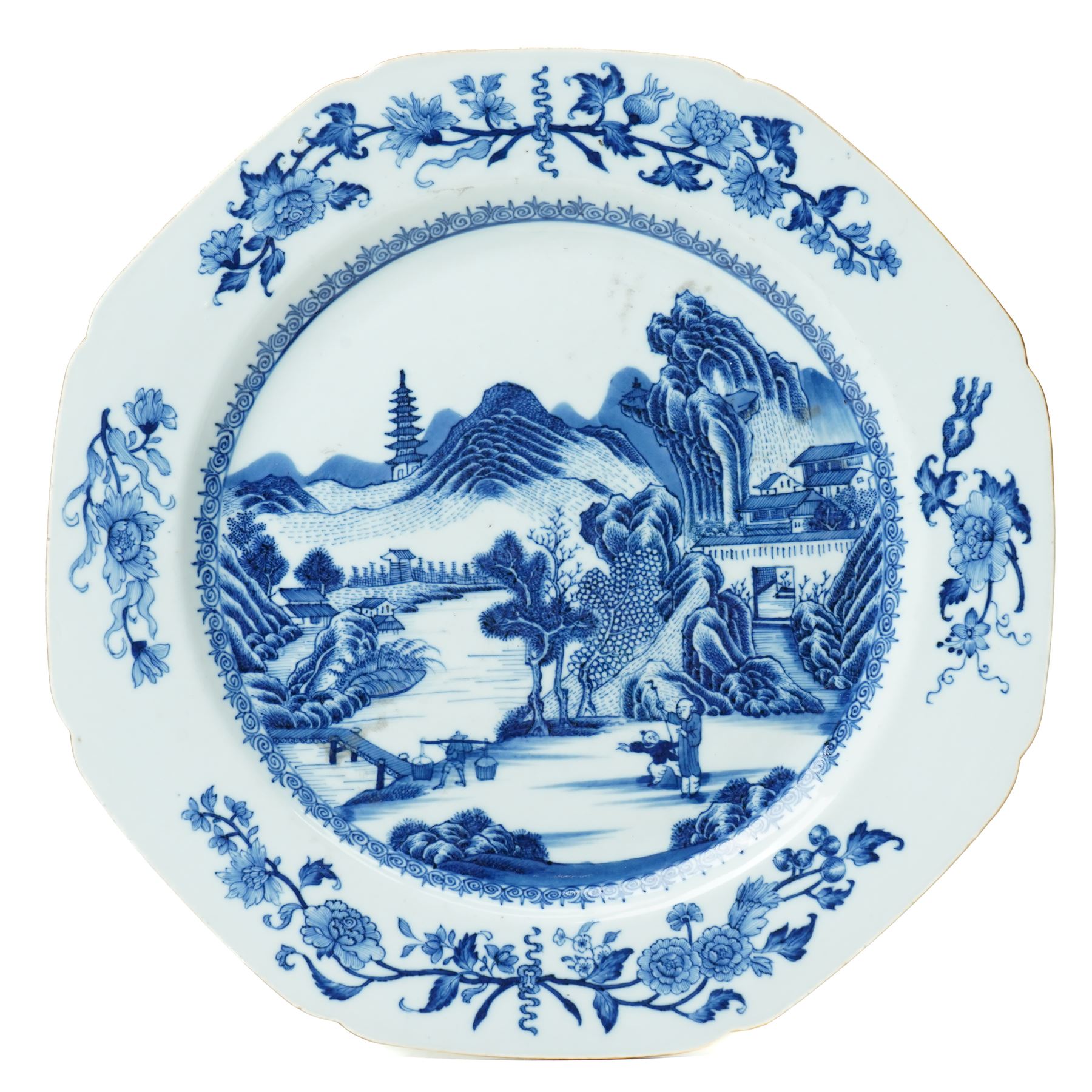 18th century Chinese plate of octagonal design decorated in blue and white with figures by a river with buildings etc W30cm on a 19th century hardwood stand