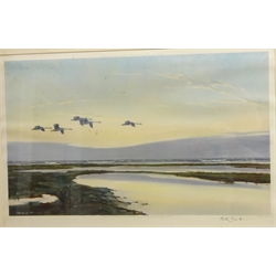  Mallards in a Yellow Sky' and ' High Tide and Wild Swans', two colour prints signed by Peter Scott (British 1908-1989) pub. Arthur Ackermann, London 37cm x 58cm and 39cm x 55.5cm (2)  